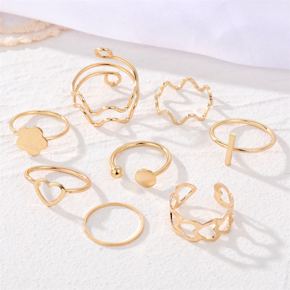 8pcs / Set Cincin Bentuk Bunga Bulat Warna Emas Gaya Vintage Untuk Wanita