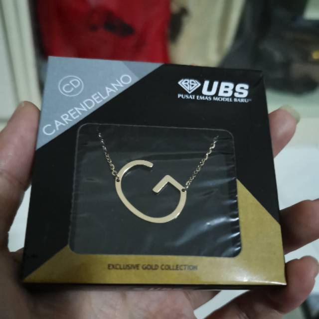 Kalung carendelano huruf G kadar 375