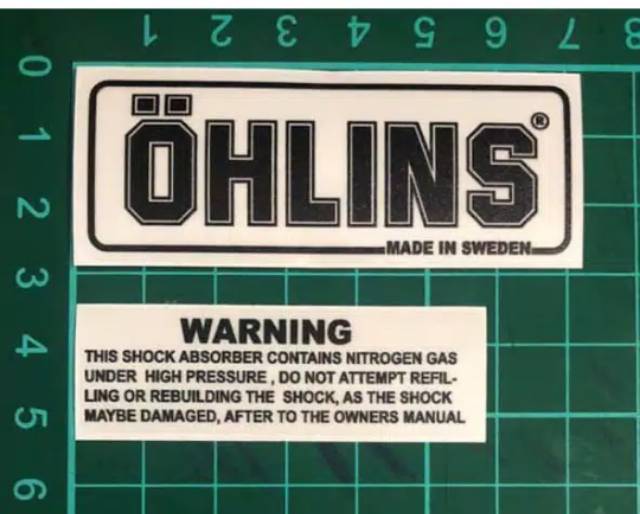 HARGA SEPASANG sticker shock ohlins set warning original tahan air tidak ngelupas kena air  / stiker ohlins tempel