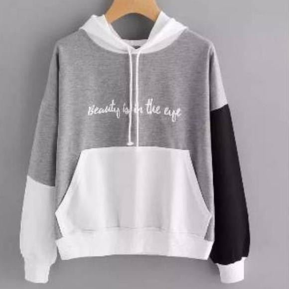 Stock Baru Sweater Wanita. Beauty is iu the eye pink fleece ,,..,,,,