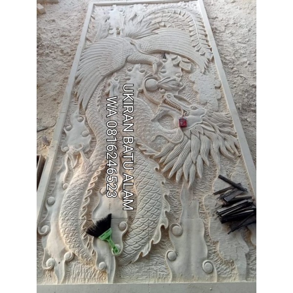 ukiran batu relief naga hiasan dinding batu alam dekorasi paras jogja 330x150