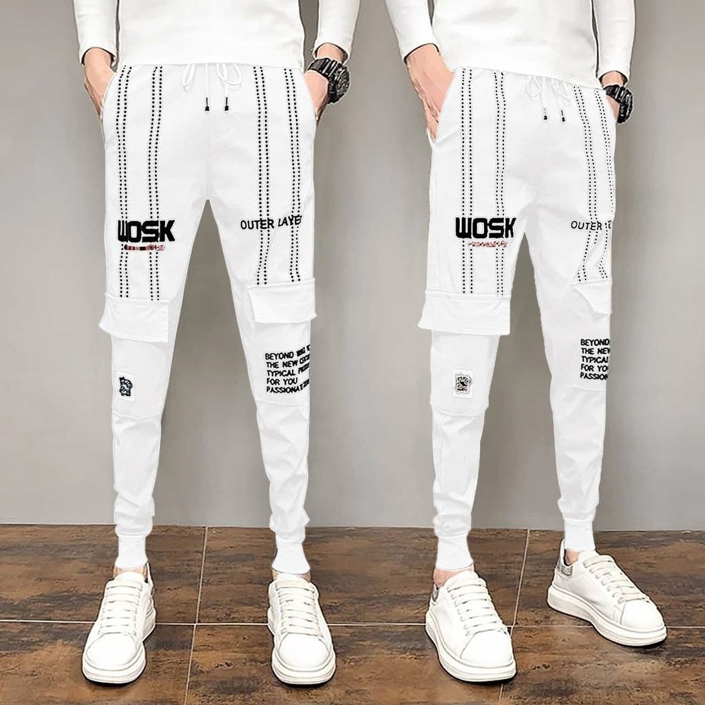 TOTOTAshop.Celana jogger pria WOSK EV,Bahan Matt Fleece tebal, motif cetak,freesize 28-34.