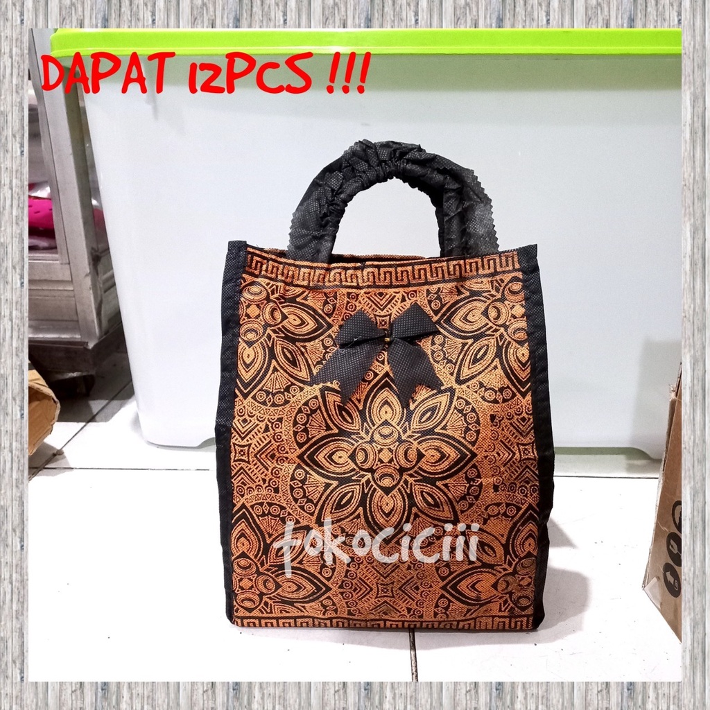

12PCS tas hajatan spunbond nindy batik bunga 22 lusinan