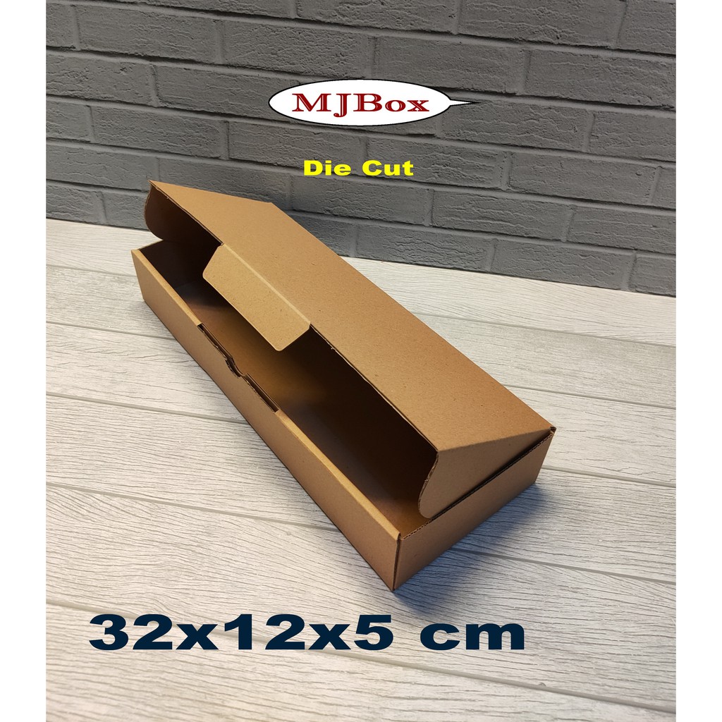 

Kardus box 32 x 12 x 5 cm kotak karton Die cut