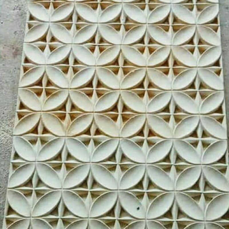 RELIEF BATIK BATU ALAM HIASAN DINDING