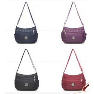 READY!! TAS WANITA XINYUANN SELEMPANG/SLING BAG TRAVELING OVAL POLOS  IMPORT PREMIUM#144555