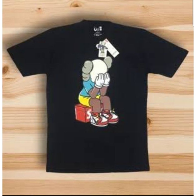 KAOS BAJU  TSHIRT UNIQLO X CRY KAWS  PRIA WANITA KAOS DISTRO 