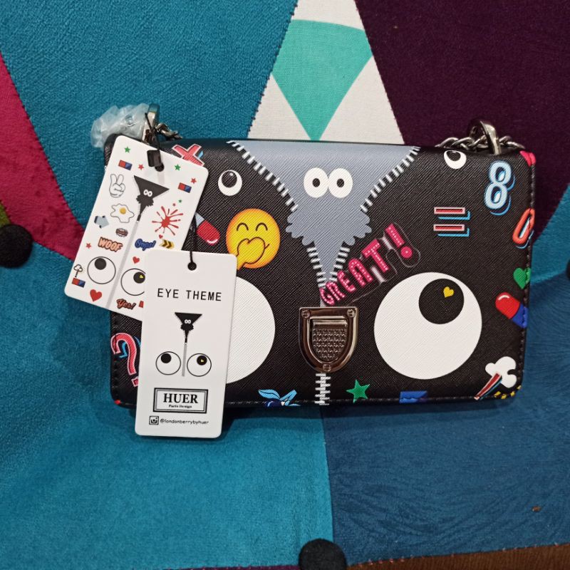 TAS SLING HUER MATA WARNA HITAM ORI STORE