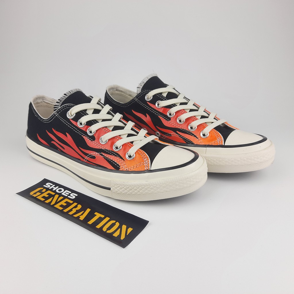 flame low top converse