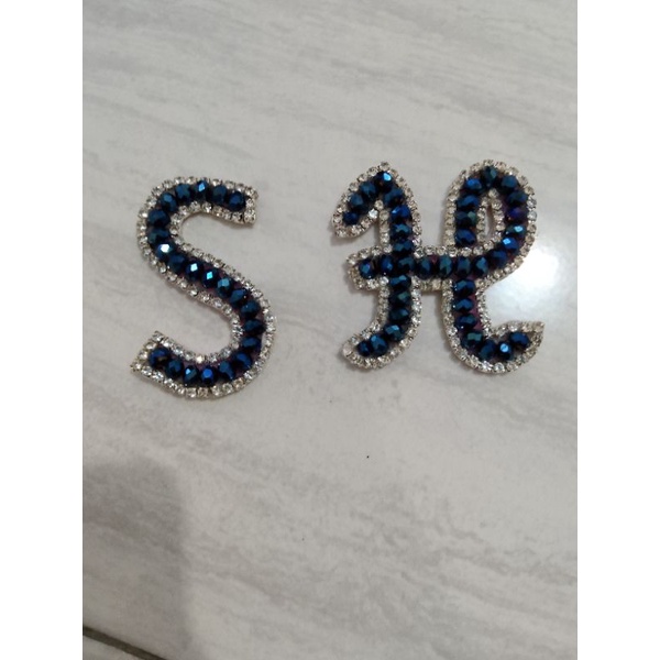 Bros Huruf S dan H kristal