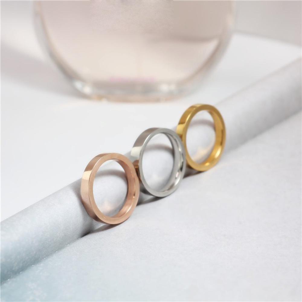 Cincin Bahan Titanium Steel Ukuran 3mm Warna Silver / Gold / Rose Gold / Hitam Untuk Pria / Wanita A6K1