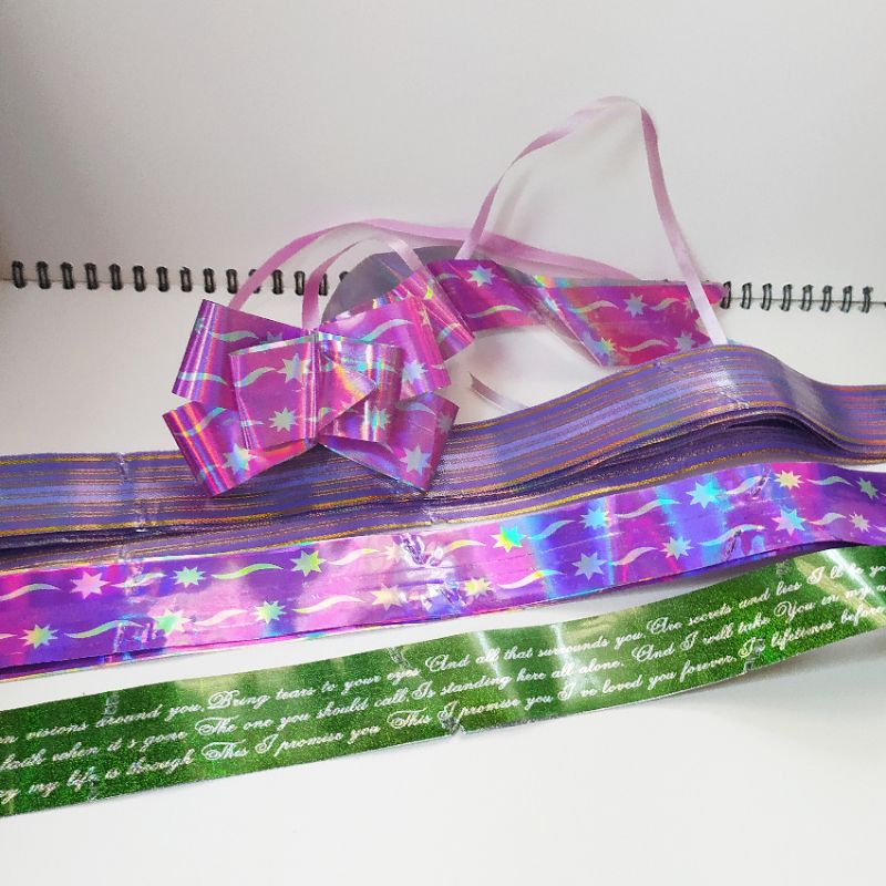 

Pita Serut Tarik Hologram 3x50cm Untuk Bingkisan Parsel / Kado / Hadiah