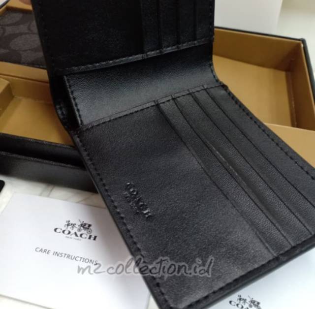 DOUBLE BILLFOLD WALLET IN SIGNATURE CANVAS WITH WOLF MOTIF (COACH F31522)