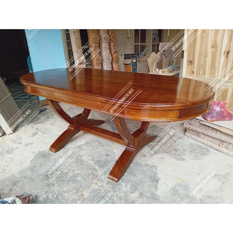 Meja makan oval kayu jati custom furniture jepara