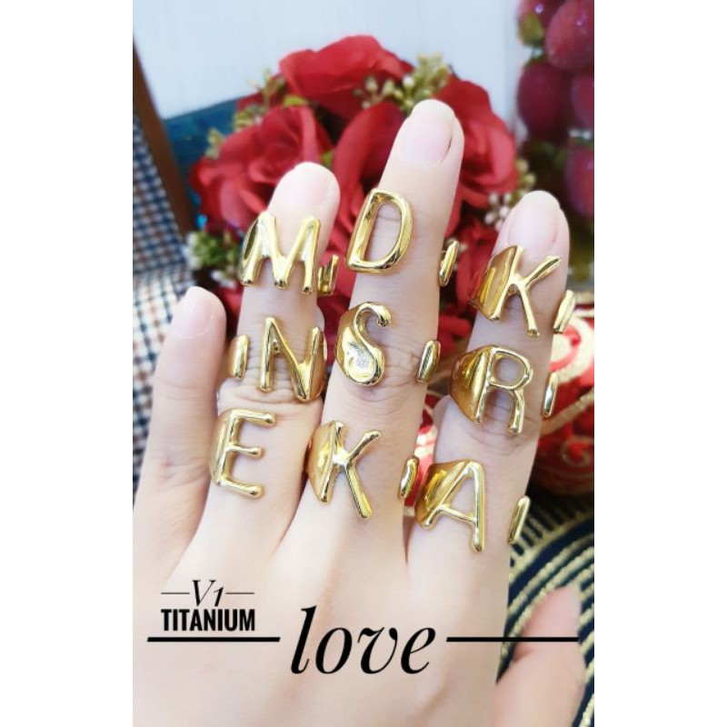 cincin titanium huruf lapis emas