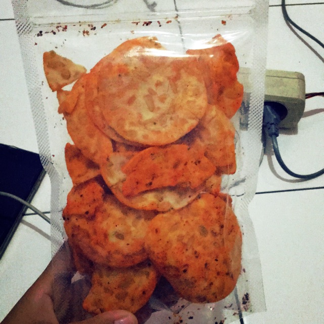 

Kripik tempe dengan rasa balado plus daun jeruk