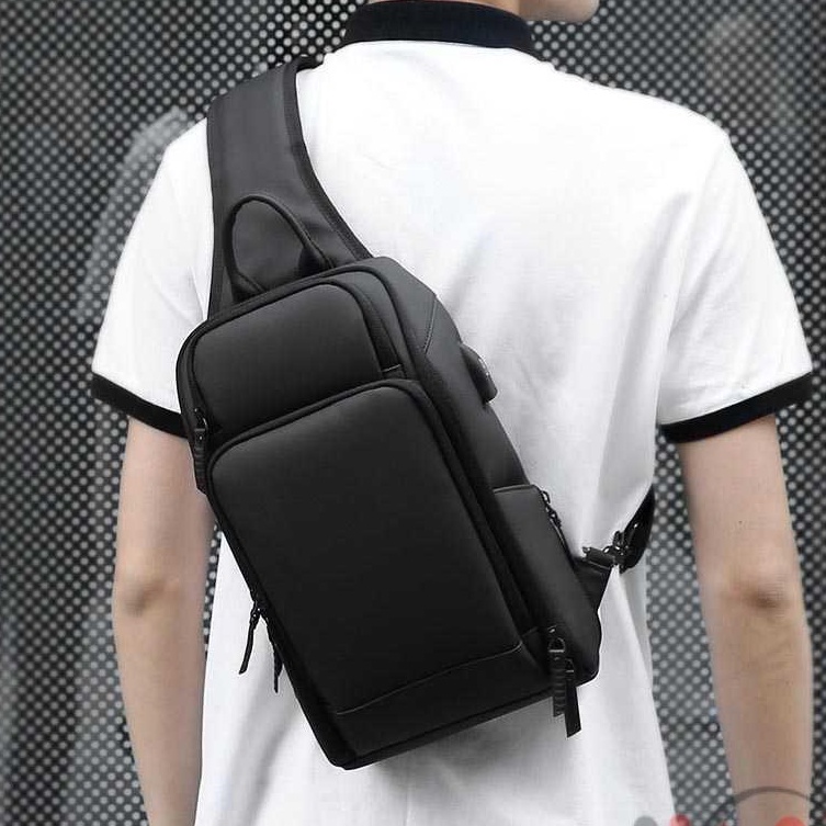 Tas Selempang Pria Tas Kerja Tas Travel Tas Pasport Anti Copet Tas Sling Bag Pria Tas Import dengan USB Charger Slot kerja kantor  Fashion Men Crossbody Bag Anti-theft USB Charging Waterproof Shoulder Bags Fit For 9.7 Inch iPad Business Chest Bag For Men