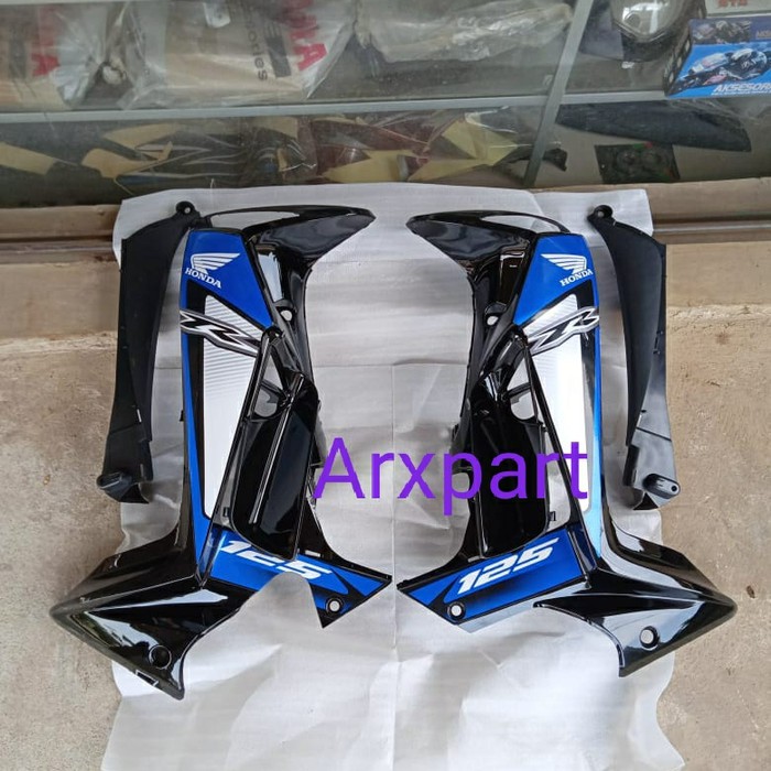 sayap supra x 125 fi biru hitam