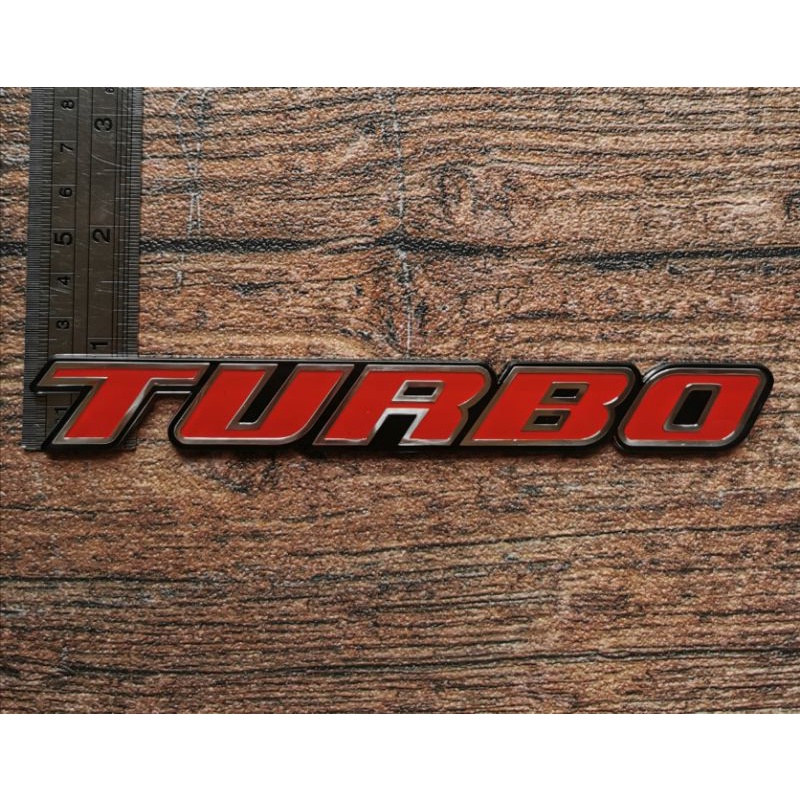 emblem tulisan Turbo merah