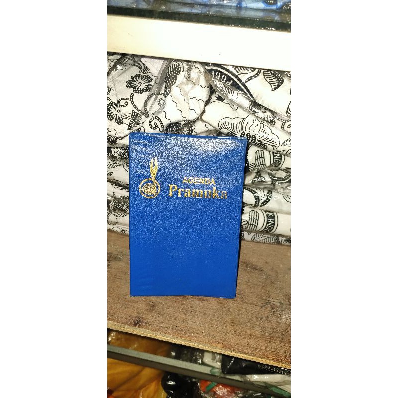 

buku agenda pramuka biru sama merah, hitam, orange hijau muda, hijau tua