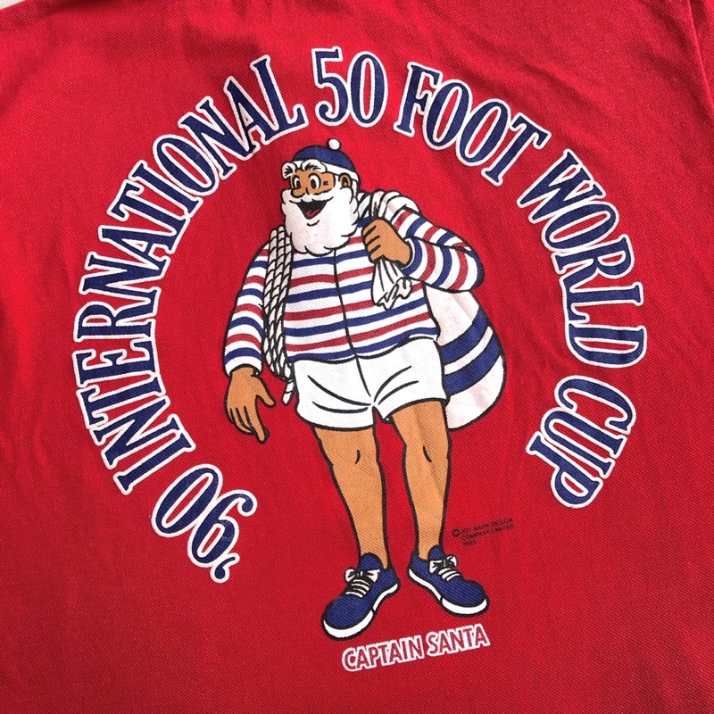 Captain Santa Club “ 90’s International 50 Foot World Cup “ Single Stitch Polo Shirt Copyright in 1985