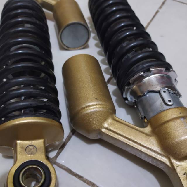 shock skok belakang tiger revo ori