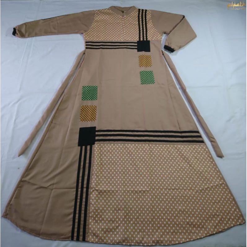 Gamis toyobo ninos polka 002/gamis terlaris/gamis terbaru/gamis tercantik/gamis elfath-krem