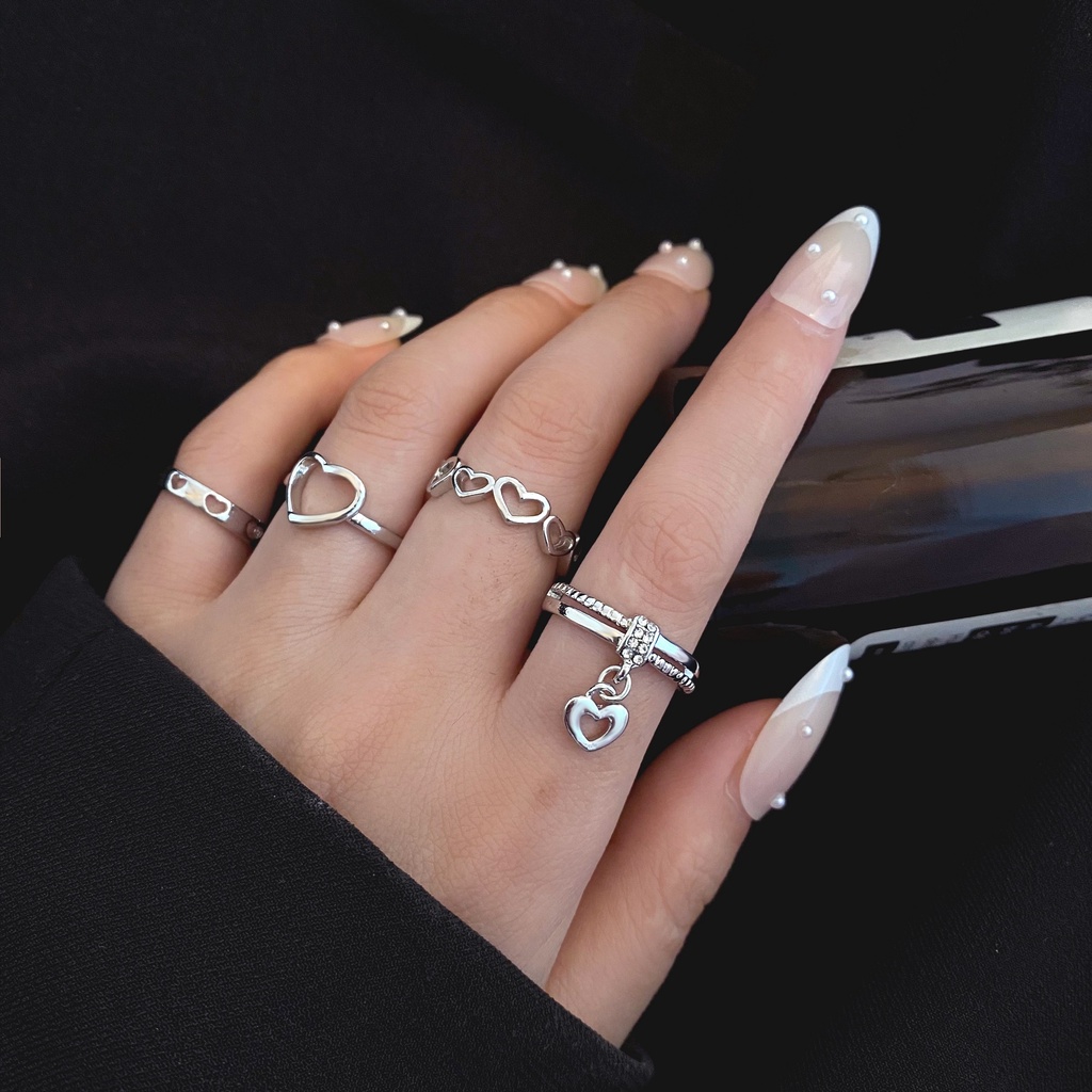 4pcs / Set Cincin Silver Desain Hati Hollow Gaya Retro Untuk Wanita