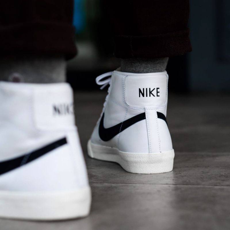 white nike blazers black tick