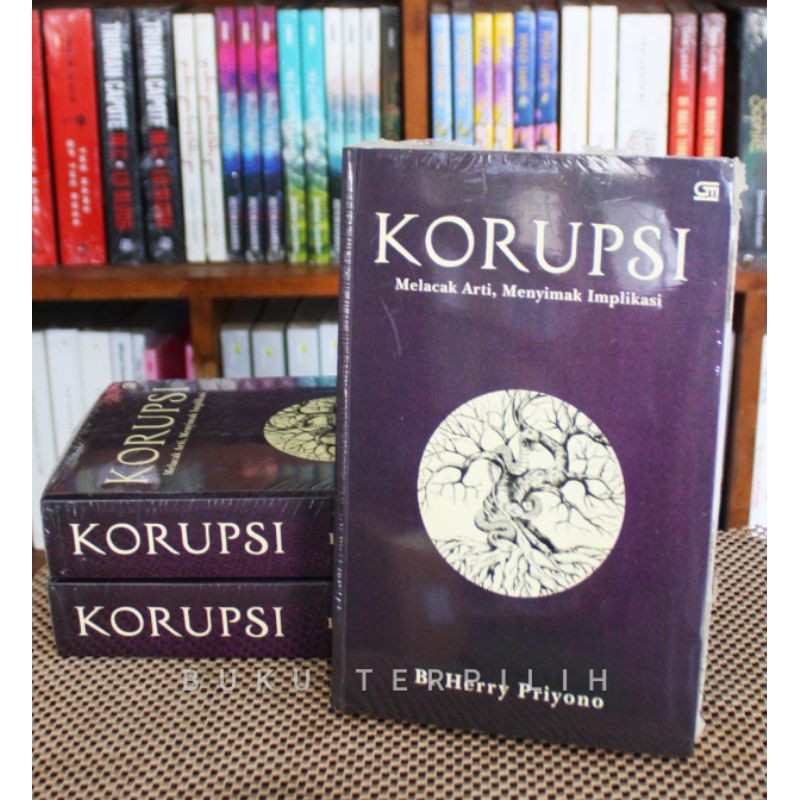 KORUPSI: MELACAK ARTI MENYIMAK IMPLIKASI