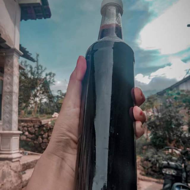 

Madu akasia hitam