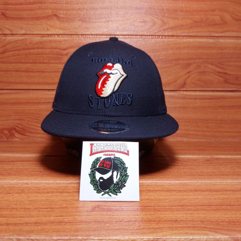TOPI NEW ERA ROLLING STONES 9FIFTY