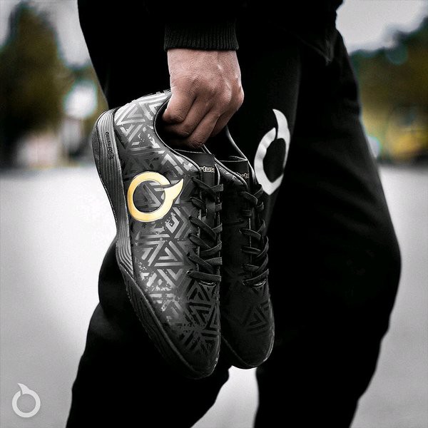 SEPATU FUTSAL ORTUS JOGOSALA SHOCKWAVE BLACK GOLD IN