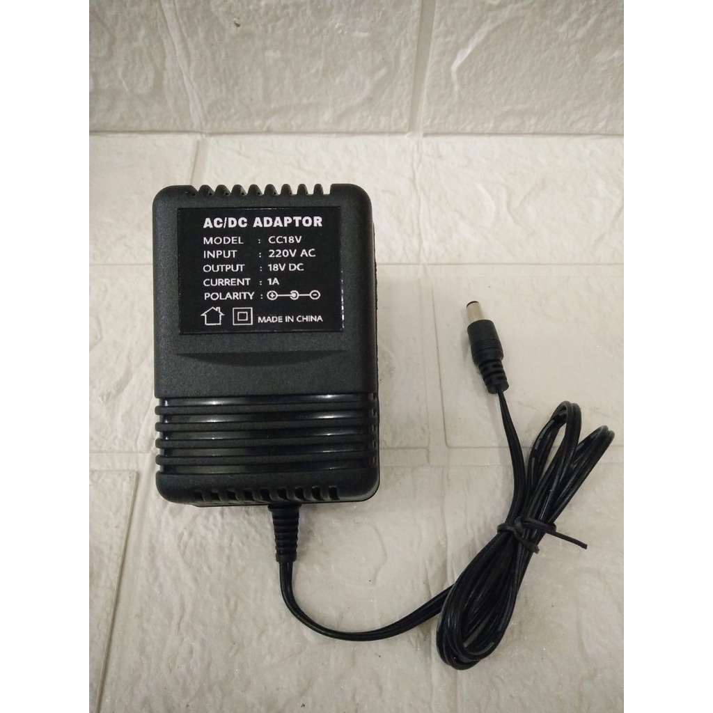 AC ADAPTOR 18V 1A Model:  CC18V