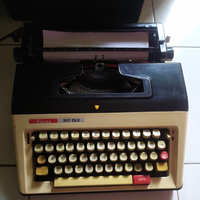 Mesin ketik manual amida bonus pita