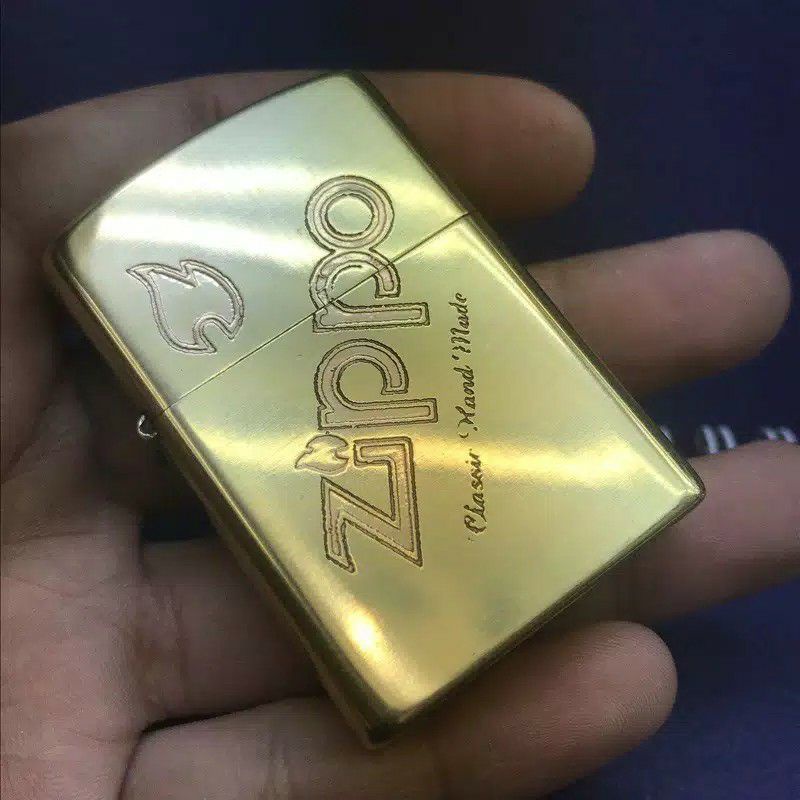 ZIPPO 2 DENTING ZIPPO GOLD