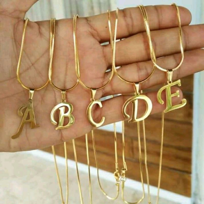 kalung huruf lapis emas