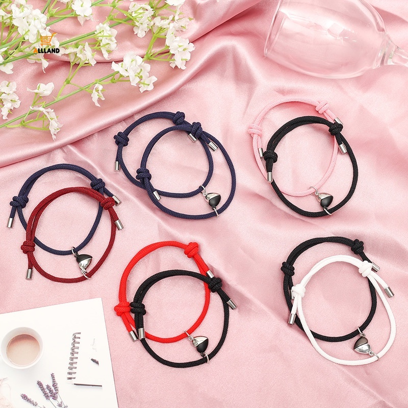 1 Pasang Gelang Magnet Liontin Dinosaurus Kecil Bahan Alloy Warna Hitam Putih Untuk Pasangan