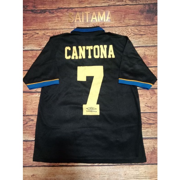 jersey bola retro MU away cantona