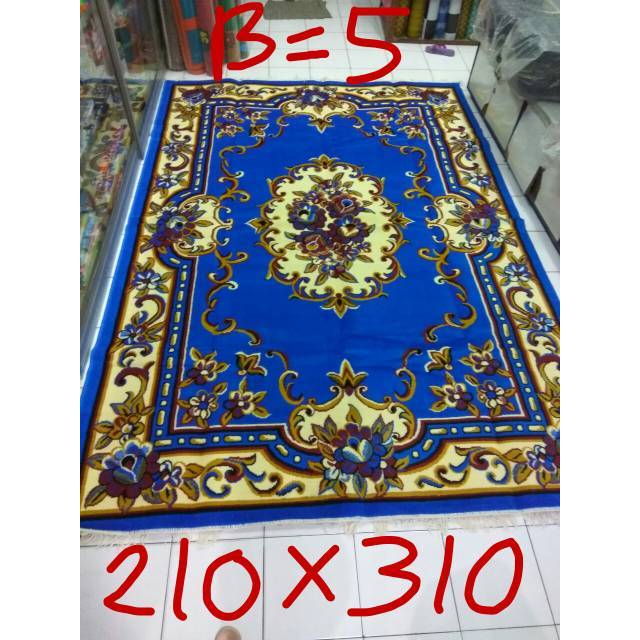 Karpet permadani motif kembang biru