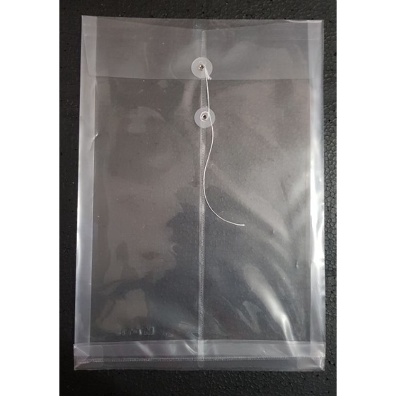 

MAP TALI PLASTIK FOLIO ISI 12 PCS TRANSPARAN AMPLOP F4 DATA BAG FILE DOCUMENT
