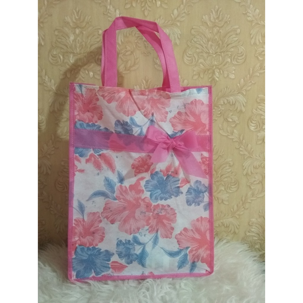 

tas spunbound souvenir model kotak pita alas kecil