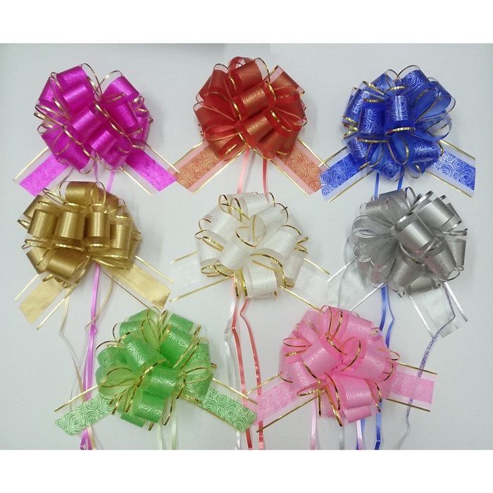 

Ginger- Pita Tarik Serut Pom Pom Motif Bunga Rose List Emas Hias Kado (1 pcs)