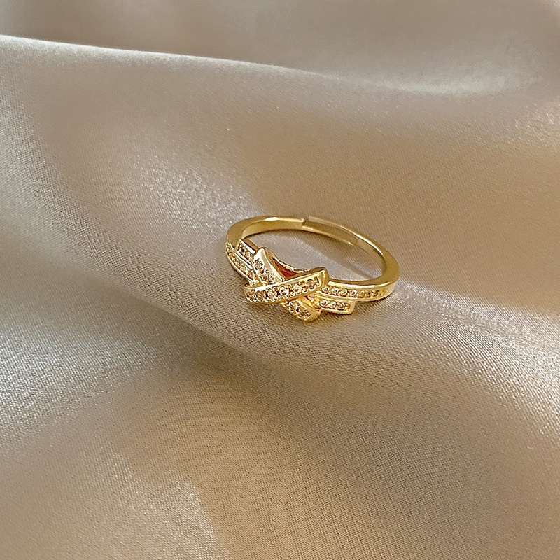 cincin wanita Color-preserving electroplating Korean version of simple and fashionable cross letter X geometric bow open ring