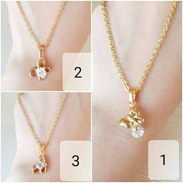 Kalung titanium gold kupu kupu Antikarat Bestquality impor