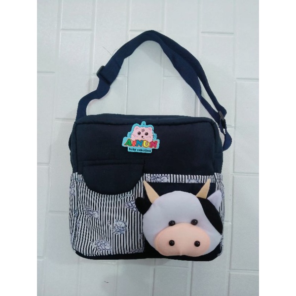 PROMO !!! Tas bayi dengan  saku depan tutup dengan tambahan boneka sapi lucu
