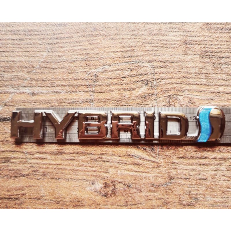 emblem tulisan Hybrid chrome