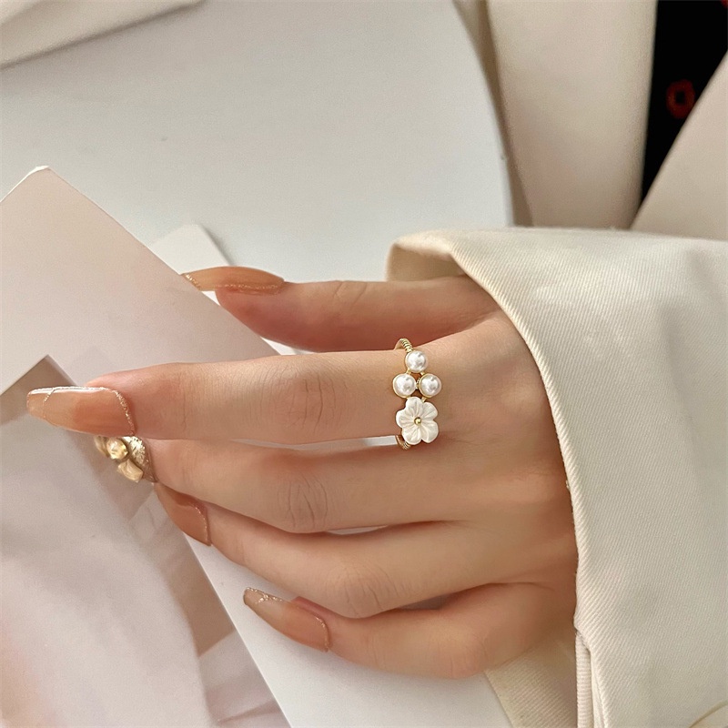 Cincin Model Terbuka Desain Bunga Aksen Mutiara Bahan Zirkon Gaya Korea Untuk Wanita