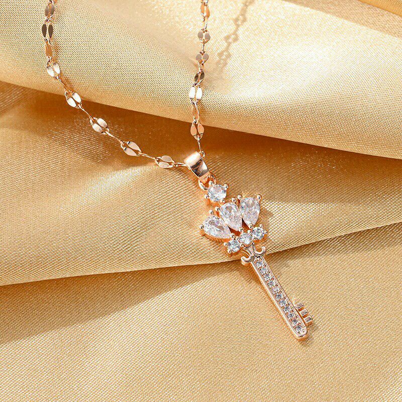 GG Kalung Kunci Batu Zicron Titanium