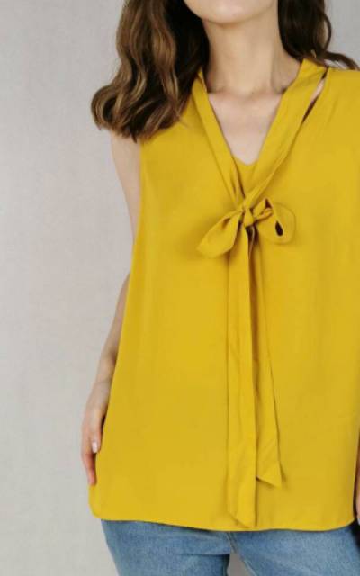 Max yellow sleeveless blouse